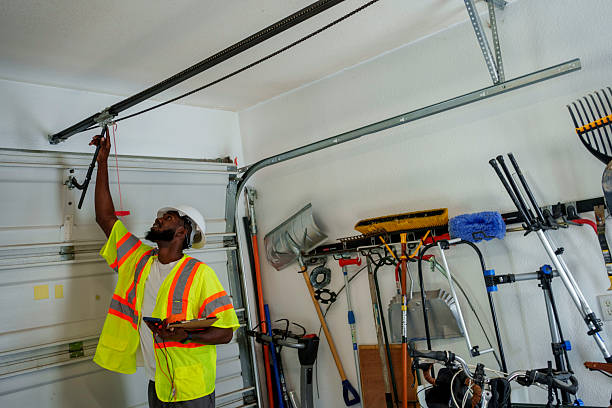 Professional Garage Door technician working in Shepherd, MI